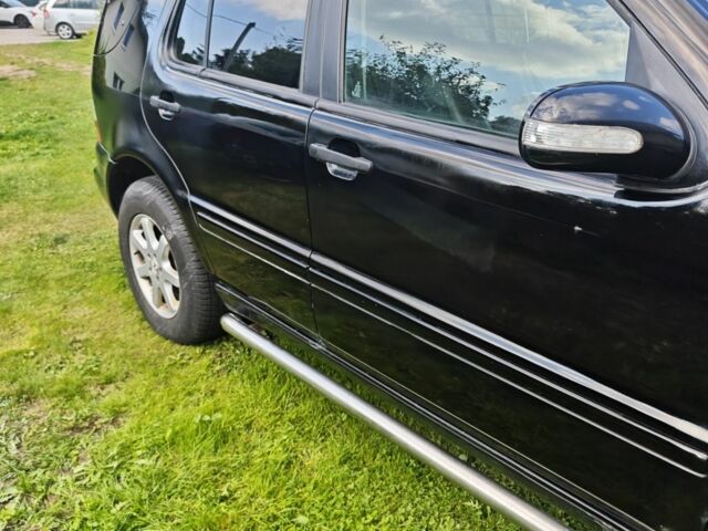 Серый Ниссан Патфайндер, объемом двигателя 3 л и пробегом 360 тыс. км за 3495 $, фото 2 на Automoto.ua