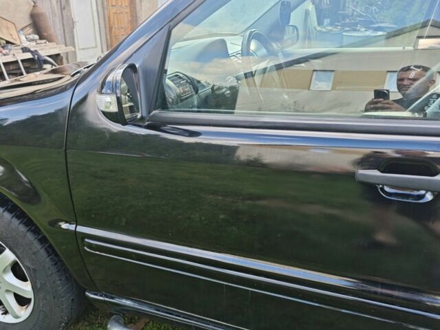 Серый Ниссан Патфайндер, объемом двигателя 3 л и пробегом 360 тыс. км за 3495 $, фото 6 на Automoto.ua