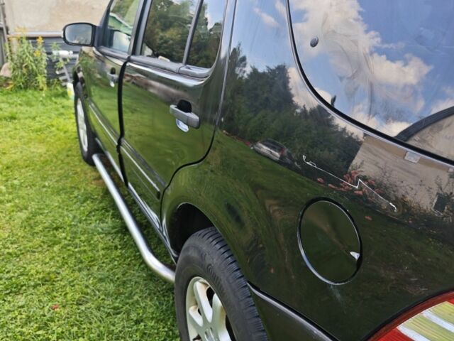 Серый Ниссан Патфайндер, объемом двигателя 3 л и пробегом 360 тыс. км за 3495 $, фото 3 на Automoto.ua