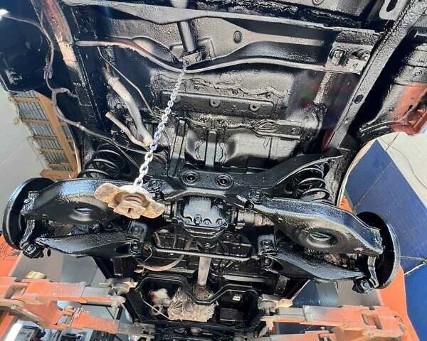 Серый Ниссан Патфайндер, объемом двигателя 2.49 л и пробегом 367 тыс. км за 12000 $, фото 4 на Automoto.ua