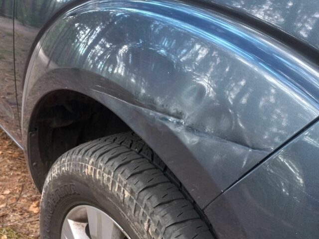 Серый Ниссан Патфайндер, объемом двигателя 2.5 л и пробегом 230 тыс. км за 6588 $, фото 3 на Automoto.ua