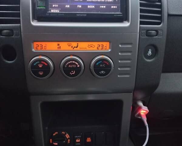 Серый Ниссан Патфайндер, объемом двигателя 2.49 л и пробегом 230 тыс. км за 6395 $, фото 6 на Automoto.ua