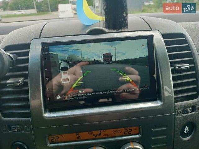 Серый Ниссан Патфайндер, объемом двигателя 2.49 л и пробегом 255 тыс. км за 11000 $, фото 8 на Automoto.ua