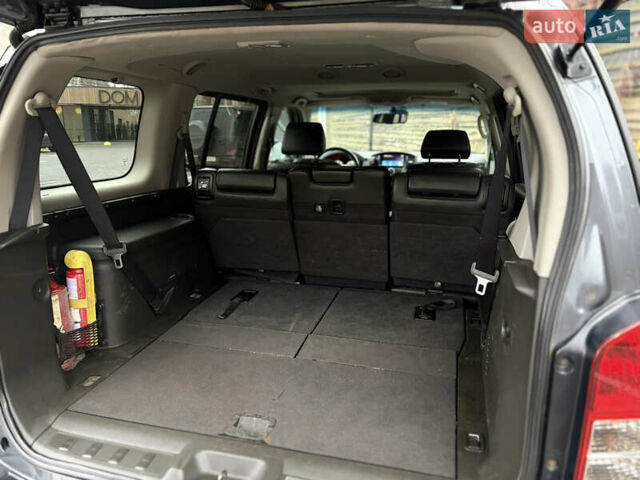 Серый Ниссан Патфайндер, объемом двигателя 2.49 л и пробегом 266 тыс. км за 15500 $, фото 11 на Automoto.ua