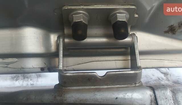 Серый Ниссан Патфайндер, объемом двигателя 2.5 л и пробегом 137 тыс. км за 17500 $, фото 4 на Automoto.ua