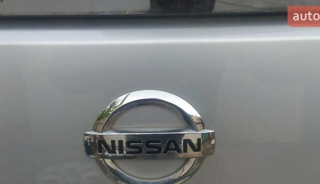 Серый Ниссан Патфайндер, объемом двигателя 2.5 л и пробегом 137 тыс. км за 17500 $, фото 2 на Automoto.ua