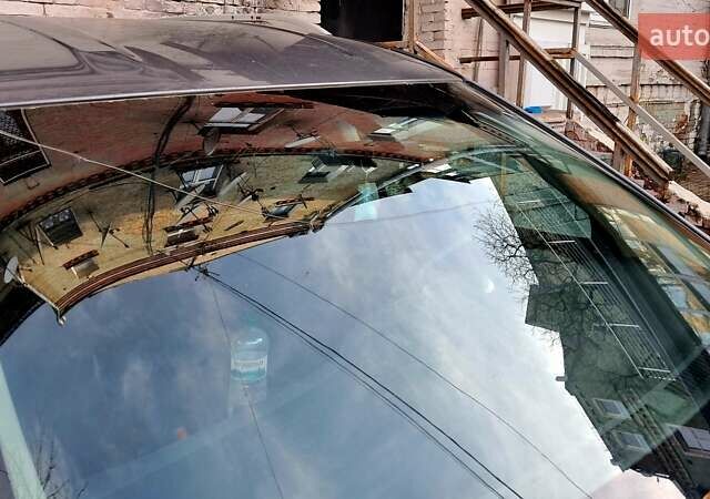 Сірий Ніссан Патфайндер, об'ємом двигуна 3.5 л та пробігом 99 тис. км за 13000 $, фото 2 на Automoto.ua