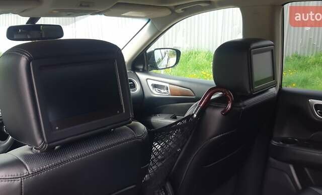 Сірий Ніссан Патфайндер, об'ємом двигуна 3.5 л та пробігом 93 тис. км за 18900 $, фото 11 на Automoto.ua