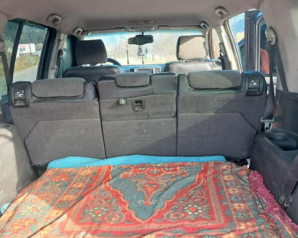 Синий Ниссан Патфайндер, объемом двигателя 2.5 л и пробегом 290 тыс. км за 9500 $, фото 7 на Automoto.ua