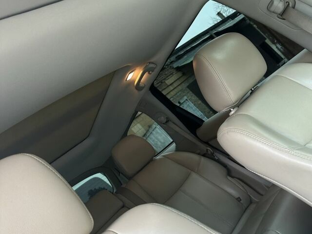 Синий Ниссан Патфайндер, объемом двигателя 3.5 л и пробегом 215 тыс. км за 13000 $, фото 3 на Automoto.ua