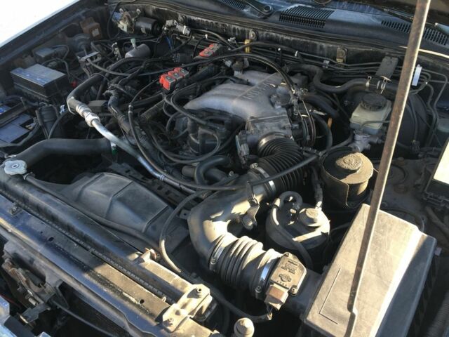 Зеленый Ниссан Патфайндер, объемом двигателя 3 л и пробегом 321 тыс. км за 4200 $, фото 8 на Automoto.ua