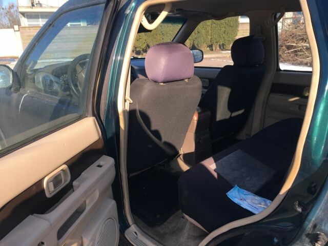 Зеленый Ниссан Патфайндер, объемом двигателя 3 л и пробегом 321 тыс. км за 4200 $, фото 2 на Automoto.ua