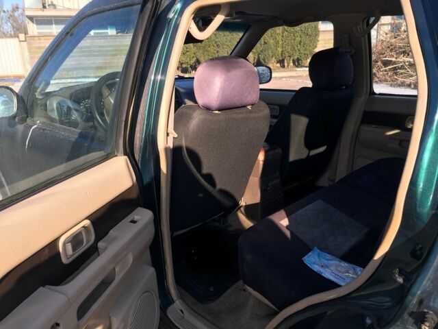 Зеленый Ниссан Патфайндер, объемом двигателя 3 л и пробегом 321 тыс. км за 4200 $, фото 10 на Automoto.ua