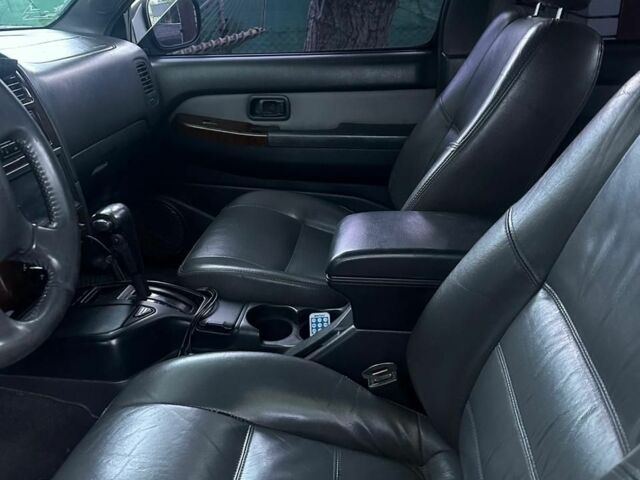 Зеленый Ниссан Патфайндер, объемом двигателя 3.3 л и пробегом 268 тыс. км за 3400 $, фото 4 на Automoto.ua