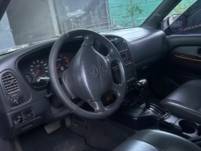 Зеленый Ниссан Патфайндер, объемом двигателя 3.3 л и пробегом 268 тыс. км за 3400 $, фото 3 на Automoto.ua