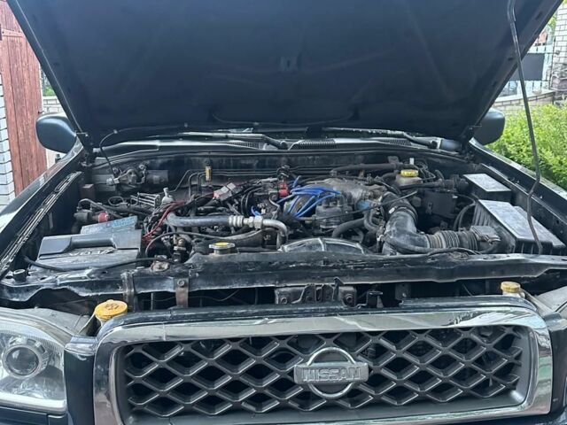 Зеленый Ниссан Патфайндер, объемом двигателя 3.3 л и пробегом 268 тыс. км за 3400 $, фото 6 на Automoto.ua