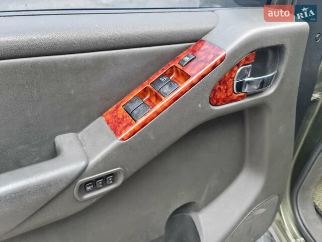 Зелений Ніссан Патфайндер, об'ємом двигуна 2.49 л та пробігом 286 тис. км за 8900 $, фото 20 на Automoto.ua