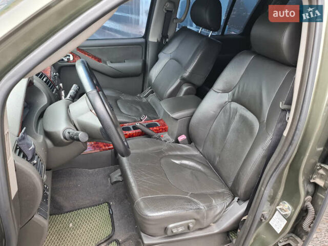 Зелений Ніссан Патфайндер, об'ємом двигуна 2.49 л та пробігом 286 тис. км за 8900 $, фото 9 на Automoto.ua