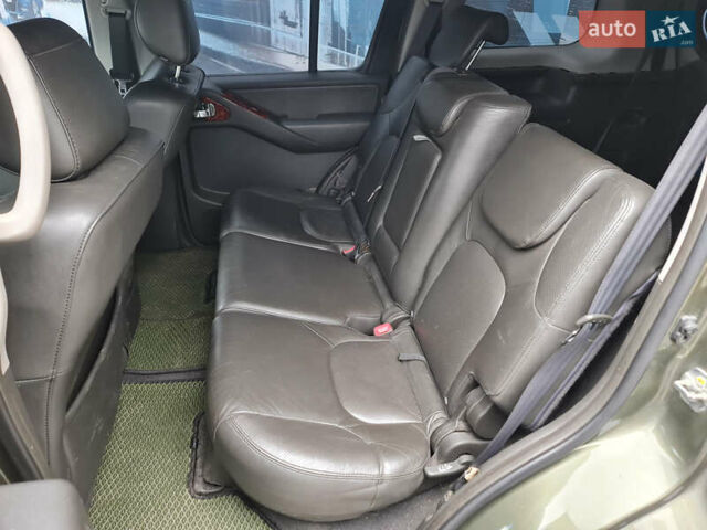 Зелений Ніссан Патфайндер, об'ємом двигуна 2.49 л та пробігом 286 тис. км за 8900 $, фото 11 на Automoto.ua