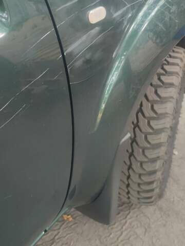 Зеленый Ниссан Патфайндер, объемом двигателя 2.49 л и пробегом 350 тыс. км за 6900 $, фото 4 на Automoto.ua