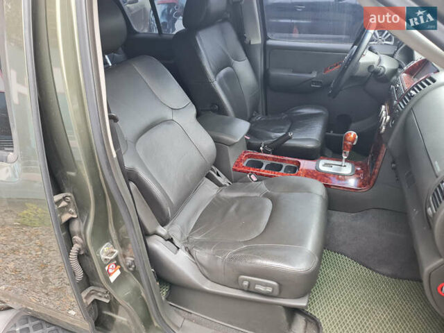 Зелений Ніссан Патфайндер, об'ємом двигуна 2.49 л та пробігом 286 тис. км за 8900 $, фото 10 на Automoto.ua