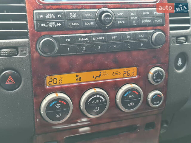 Зелений Ніссан Патфайндер, об'ємом двигуна 2.49 л та пробігом 286 тис. км за 8900 $, фото 17 на Automoto.ua