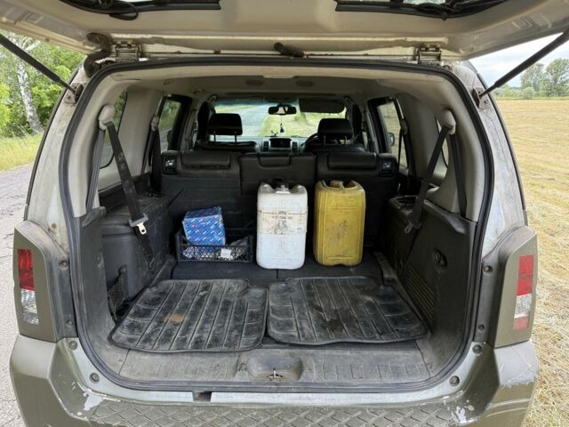 Зелений Ніссан Патфайндер, об'ємом двигуна 0 л та пробігом 2 тис. км за 7200 $, фото 10 на Automoto.ua