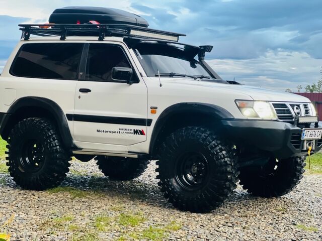 Белый Ниссан Патрол, объемом двигателя 2.8 л и пробегом 201 тыс. км за 19999 $, фото 5 на Automoto.ua