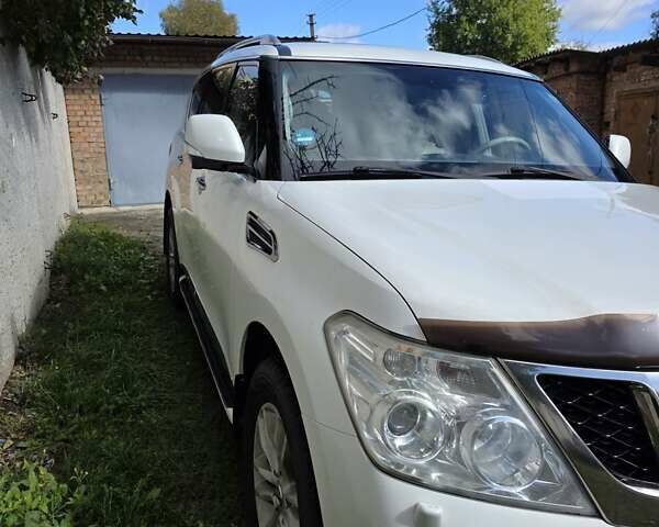 Белый Ниссан Патрол, объемом двигателя 5.6 л и пробегом 224 тыс. км за 15000 $, фото 5 на Automoto.ua