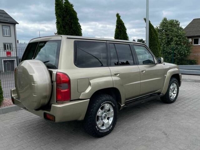 Бежевий Ніссан Патрол, об'ємом двигуна 3 л та пробігом 125 тис. км за 20999 $, фото 5 на Automoto.ua