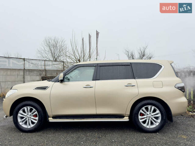 Бежевый Ниссан Патрол, объемом двигателя 5.6 л и пробегом 266 тыс. км за 16000 $, фото 12 на Automoto.ua