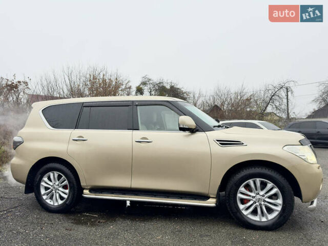 Бежевый Ниссан Патрол, объемом двигателя 5.6 л и пробегом 266 тыс. км за 16000 $, фото 15 на Automoto.ua