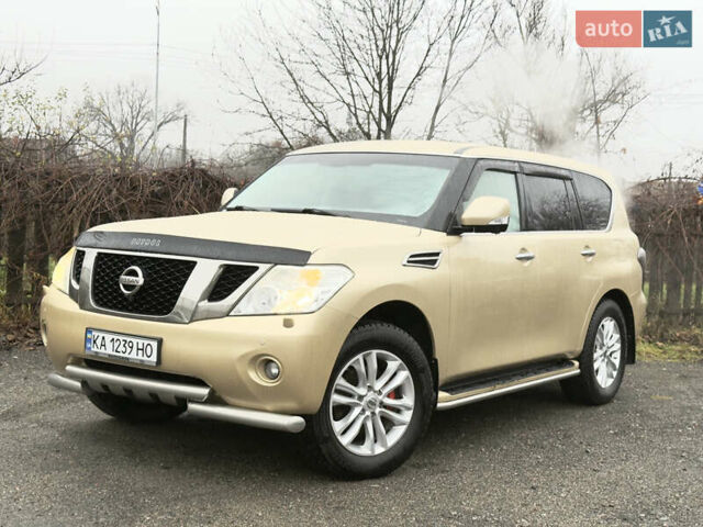 Бежевый Ниссан Патрол, объемом двигателя 5.6 л и пробегом 266 тыс. км за 16000 $, фото 2 на Automoto.ua