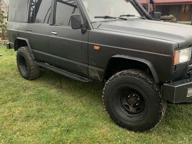 Черный Ниссан Патрол, объемом двигателя 2.8 л и пробегом 400 тыс. км за 8000 $, фото 1 на Automoto.ua