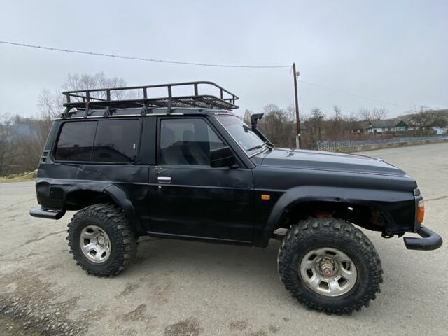 Чорний Ніссан Патрол, об'ємом двигуна 0 л та пробігом 281 тис. км за 4750 $, фото 5 на Automoto.ua