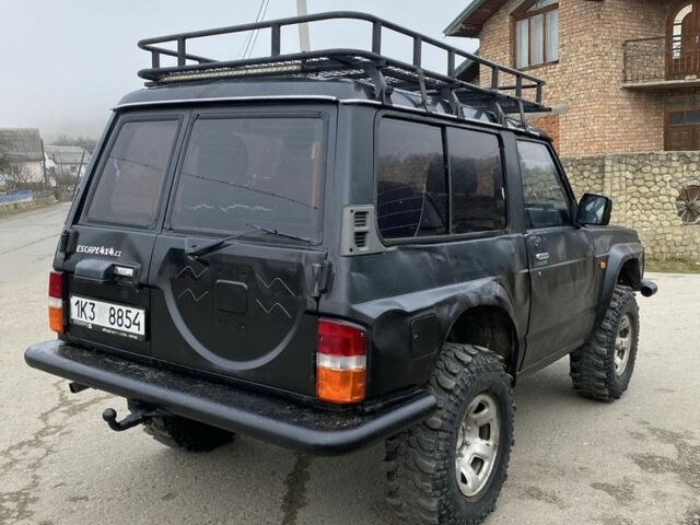 Чорний Ніссан Патрол, об'ємом двигуна 0 л та пробігом 281 тис. км за 4750 $, фото 4 на Automoto.ua
