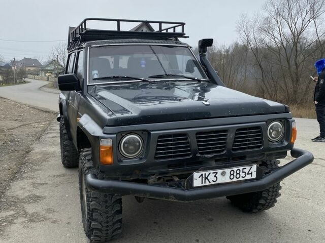 Чорний Ніссан Патрол, об'ємом двигуна 0 л та пробігом 281 тис. км за 4750 $, фото 6 на Automoto.ua
