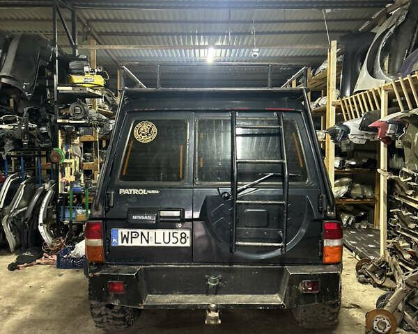 Черный Ниссан Патрол, объемом двигателя 0 л и пробегом 300 тыс. км за 7200 $, фото 3 на Automoto.ua