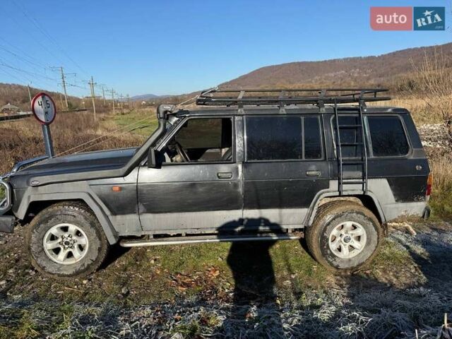 Черный Ниссан Патрол, объемом двигателя 2.8 л и пробегом 300 тыс. км за 5250 $, фото 5 на Automoto.ua