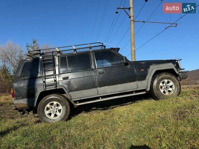 Черный Ниссан Патрол, объемом двигателя 2.8 л и пробегом 300 тыс. км за 5250 $, фото 2 на Automoto.ua