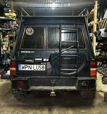 Черный Ниссан Патрол, объемом двигателя 0 л и пробегом 300 тыс. км за 7200 $, фото 4 на Automoto.ua