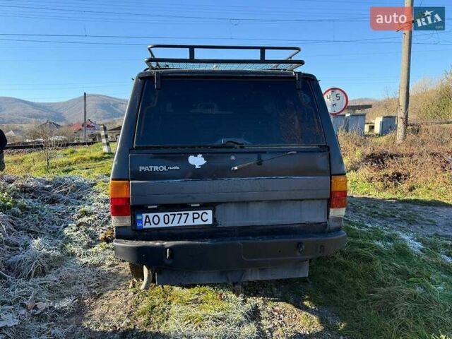 Черный Ниссан Патрол, объемом двигателя 2.8 л и пробегом 300 тыс. км за 5250 $, фото 3 на Automoto.ua