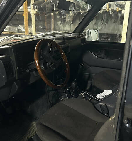 Черный Ниссан Патрол, объемом двигателя 0 л и пробегом 300 тыс. км за 7200 $, фото 2 на Automoto.ua