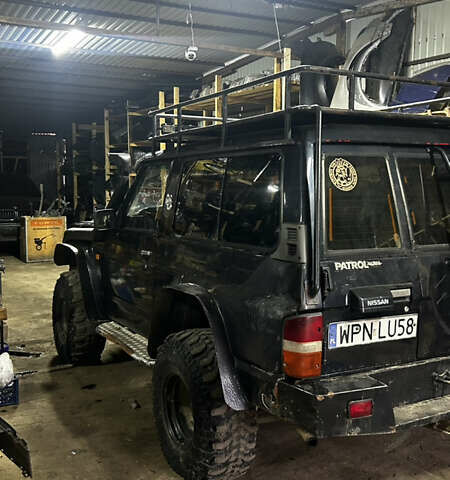 Черный Ниссан Патрол, объемом двигателя 0 л и пробегом 300 тыс. км за 7200 $, фото 10 на Automoto.ua