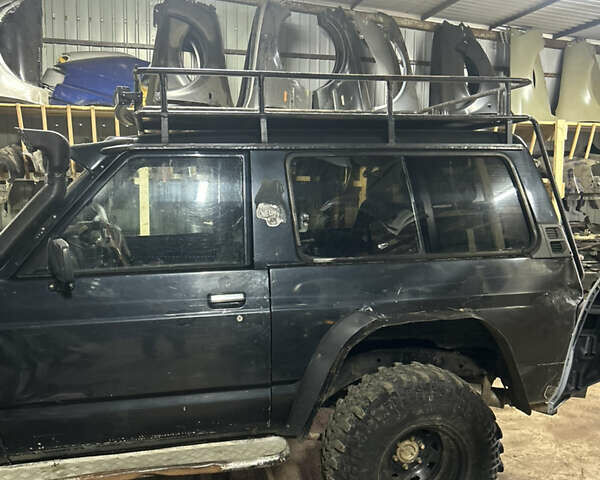 Черный Ниссан Патрол, объемом двигателя 0 л и пробегом 300 тыс. км за 7200 $, фото 11 на Automoto.ua