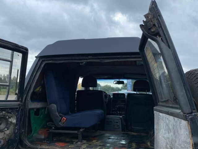 Чорний Ніссан Патрол, об'ємом двигуна 0 л та пробігом 250 тис. км за 5600 $, фото 2 на Automoto.ua