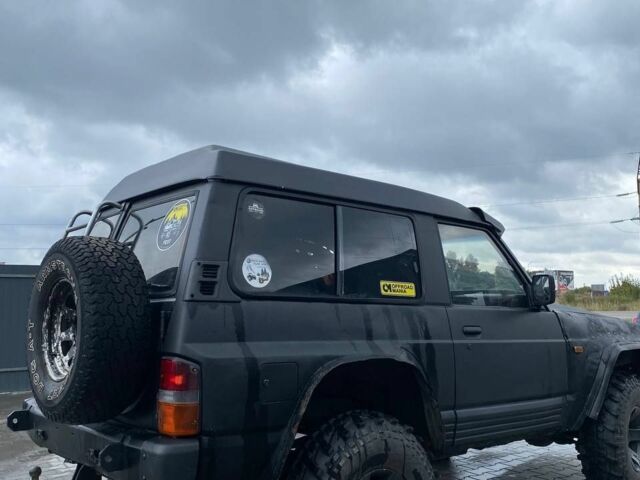 Чорний Ніссан Патрол, об'ємом двигуна 0 л та пробігом 250 тис. км за 7500 $, фото 1 на Automoto.ua