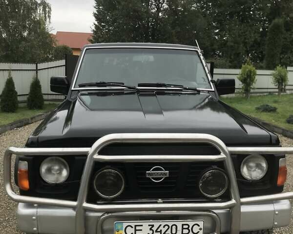 Чорний Ніссан Патрол, об'ємом двигуна 2.8 л та пробігом 306 тис. км за 12000 $, фото 4 на Automoto.ua