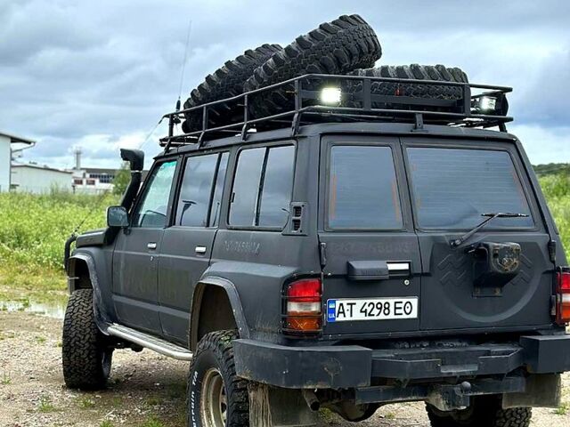 Чорний Ніссан Патрол, об'ємом двигуна 4.2 л та пробігом 0 тис. км за 7500 $, фото 7 на Automoto.ua