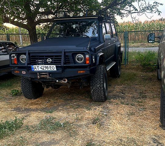 Чорний Ніссан Патрол, об'ємом двигуна 4.2 л та пробігом 0 тис. км за 7500 $, фото 6 на Automoto.ua